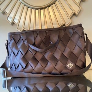 - Maggie’s Woven Seatbelt bag (crossbody)